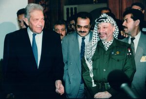 Late Palestinian president Yasser Arafat with late Israeli president Ezer Weizman and MK Achmad Tibi, in Pretoria, South Africa. 1994. Photo by Moshe Shai/FLASH90